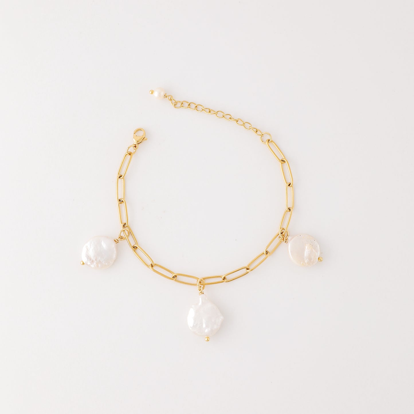 Baroque Pearl Charm Bracelet: Stainless Steel Station Bracelet