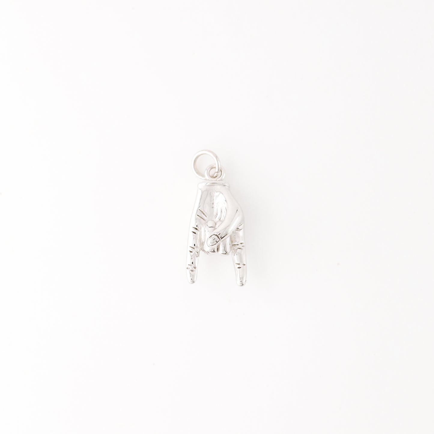 Silver Hand Gesture Charm in Stainless Steel • BYSDMJEWELS