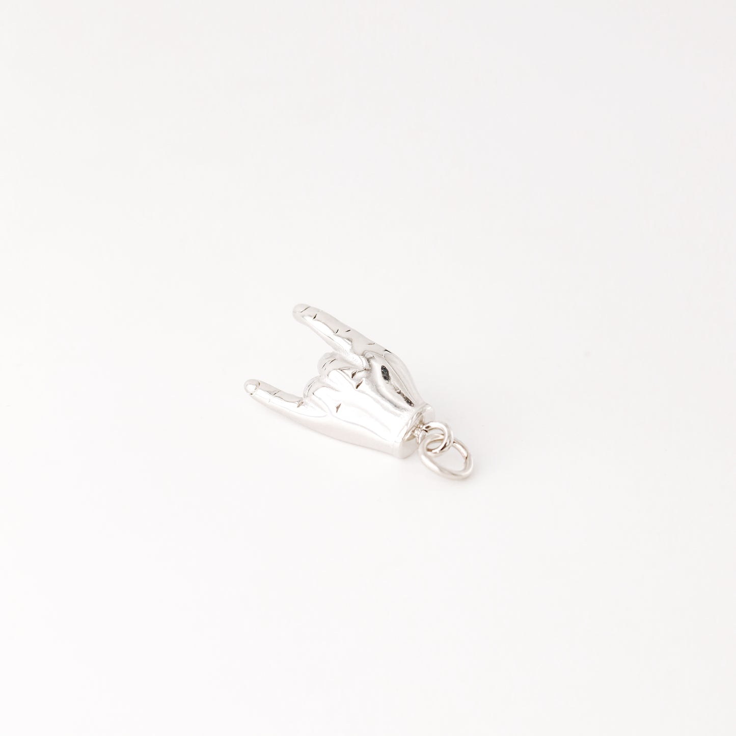 Silver Hand Gesture Charm in Stainless Steel • BYSDMJEWELS