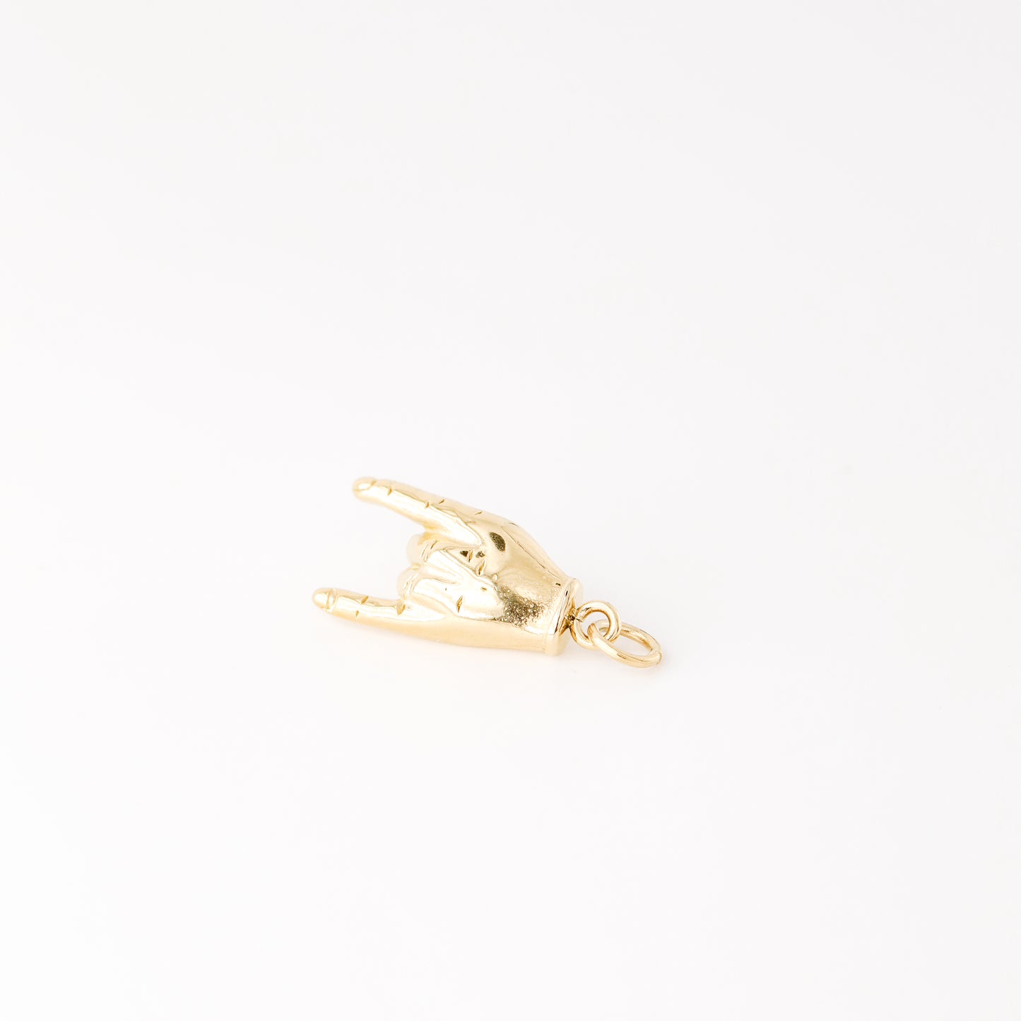 Gold Hand Gesture Charm in Stainless Steel • BYSDMJEWELS