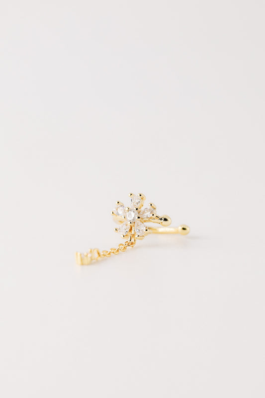 Sparkling flower ear cuff with dainty drop chain in 18k gold plated sterling silver and 925 silver, worn on cartilage without piercing.