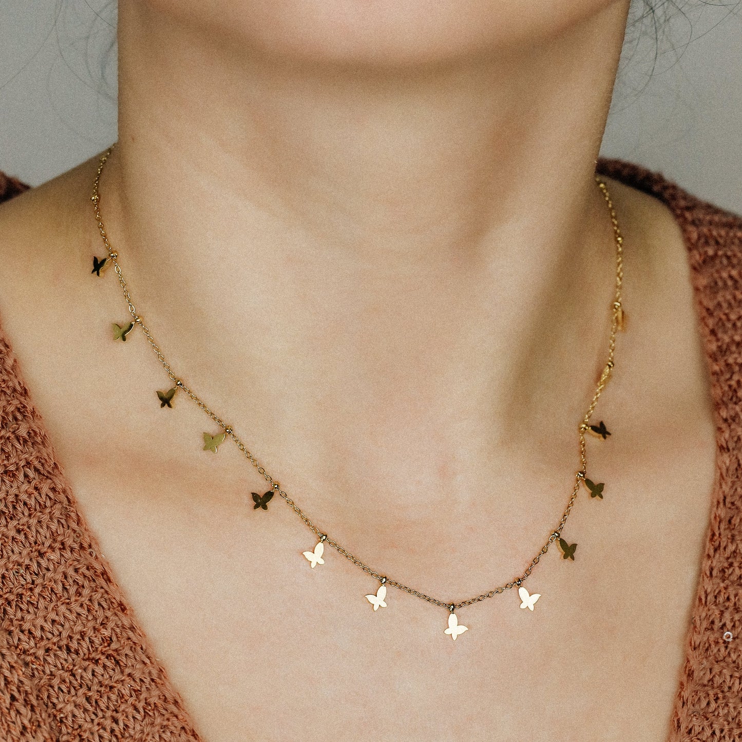Indulge in the ethereal charm of our Butterflies Necklace! This dainty and minimal boho beaded necklace features delicate gold butterflies, creating a layered and feminine look. Perfect for adding a touch of bohemian flair to any outfit. Elevate your style with our Butterflies Necklace!