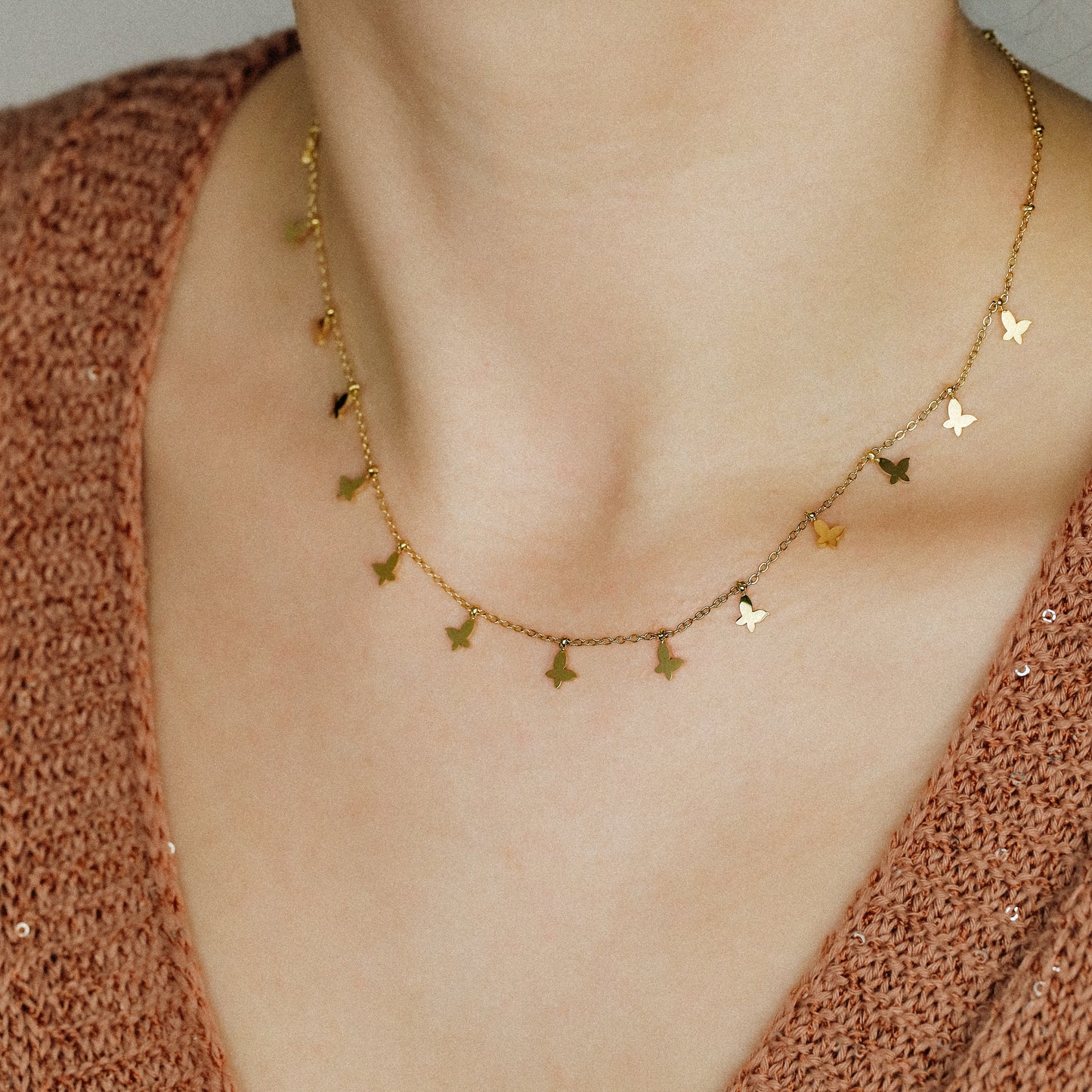 Indulge in the ethereal charm of our Butterflies Necklace! This dainty and minimal boho beaded necklace features delicate gold butterflies, creating a layered and feminine look. Perfect for adding a touch of bohemian flair to any outfit. Elevate your style with our Butterflies Necklace!