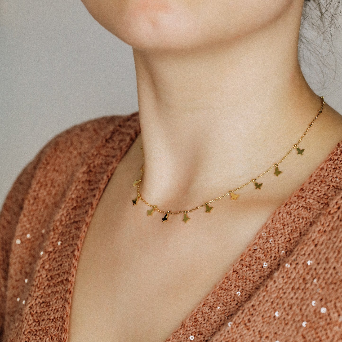 Indulge in the ethereal charm of our Butterflies Necklace! This dainty and minimal boho beaded necklace features delicate gold butterflies, creating a layered and feminine look. Perfect for adding a touch of bohemian flair to any outfit. Elevate your style with our Butterflies Necklace!