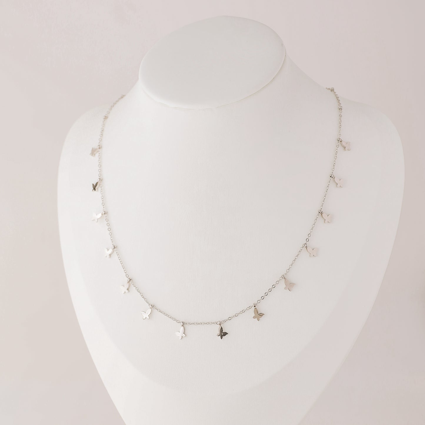 Indulge in the ethereal charm of our Butterflies Necklace! This dainty and minimal boho beaded necklace features delicate gold butterflies, creating a layered and feminine look. Perfect for adding a touch of bohemian flair to any outfit. Elevate your style with our Butterflies Necklace!