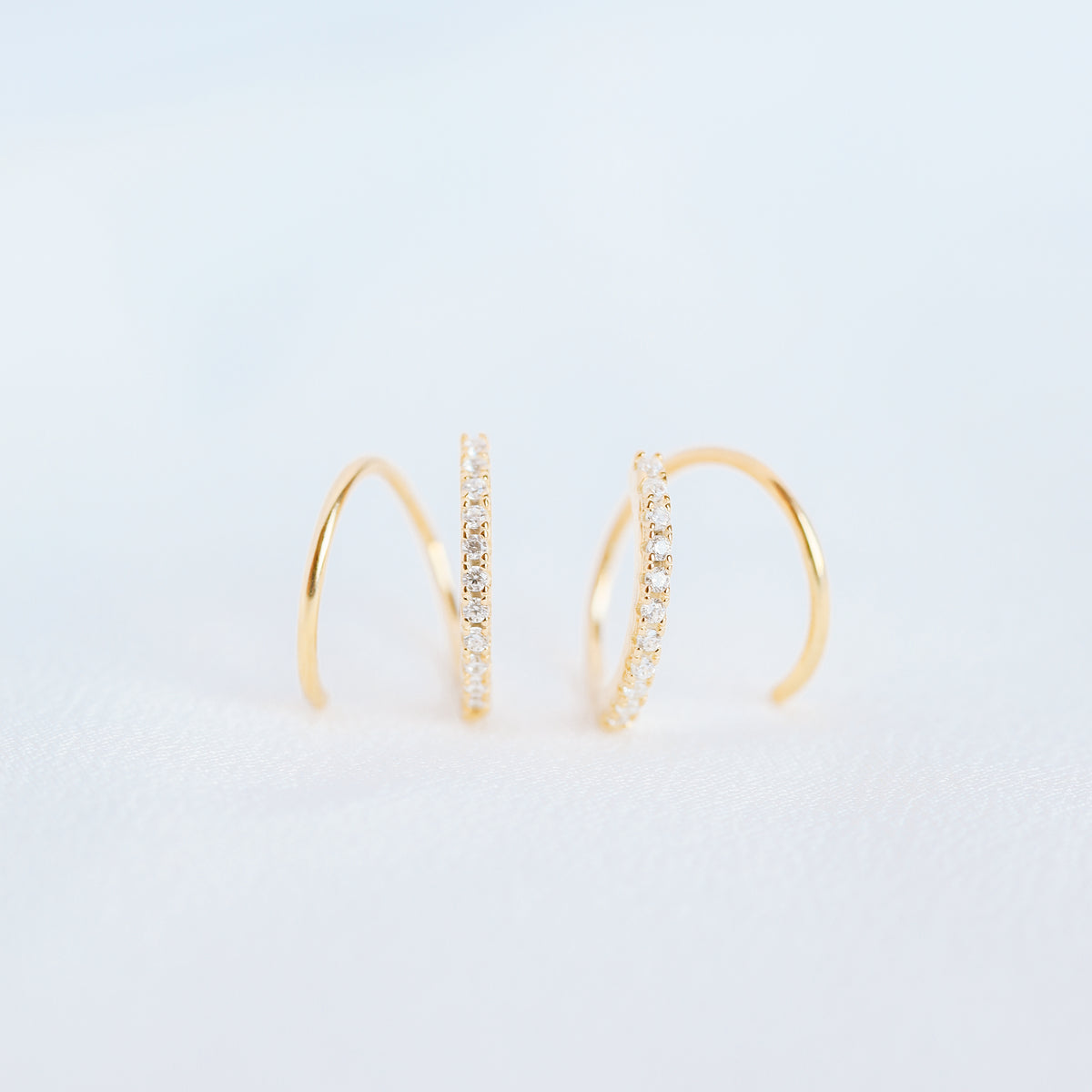 Minimalist twist huggie earring for single lobe piercing