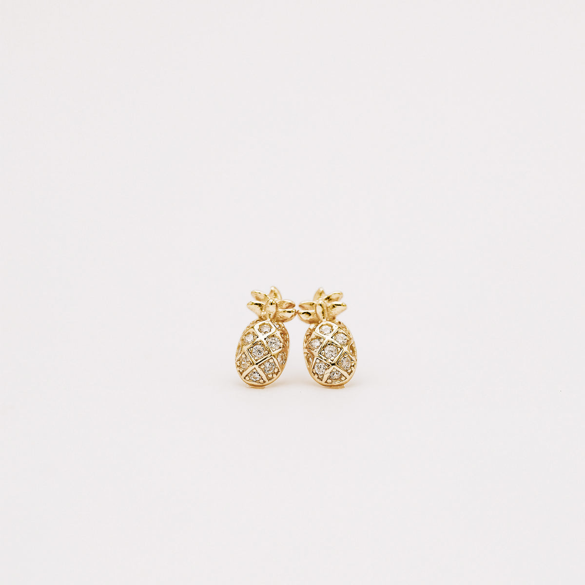 Minimal pineapple earrings inspired by tropical summer style