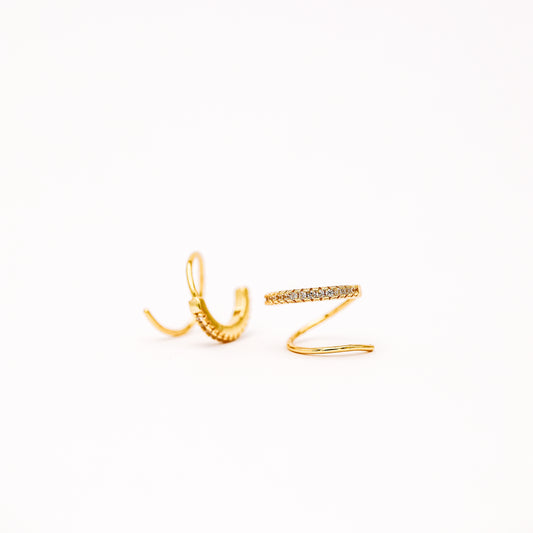 Single piercing double hoop illusion huggie earring close up