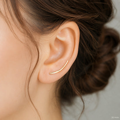 Handmade 50 mm minimalist ear climber earrings worn through one standard lobe piercing and rotated upward to follow the natural curve of the ear, featuring a long clean hand hammered wire design with an elegant ear sweep shape, available as a single left ear climber, single right ear climber or pair in solid 925 sterling silver, 14k gold filled and 14k rose gold filled, with length options from 10mm to 50mm.