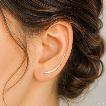 Handmade 50 mm minimalist ear climber earrings worn through one standard lobe piercing and rotated upward to follow the natural curve of the ear, featuring a long clean hand hammered wire design with an elegant ear sweep shape, available as a single left ear climber, single right ear climber or pair in solid 925 sterling silver, 14k gold filled and 14k rose gold filled, with length options from 10mm to 50mm.