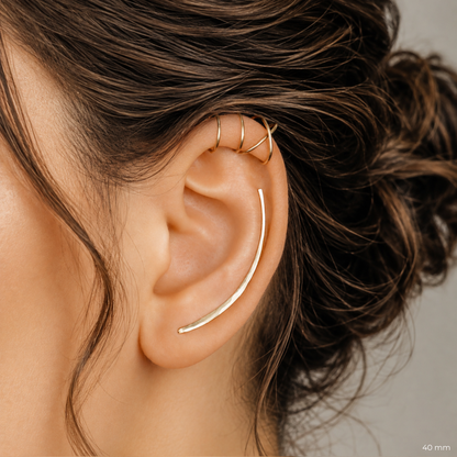 Long 40mm ear climber and ear cuff set worn along the ear for a visible minimalist layered effect, featuring a hand hammered climber for one standard lobe piercing and matching no-piercing helix cuffs, available in solid 925 sterling silver, 14k gold filled and 14k rose gold filled.