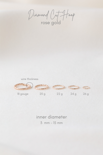 Boucle d'oreille hélice soleil ou lune en or rose