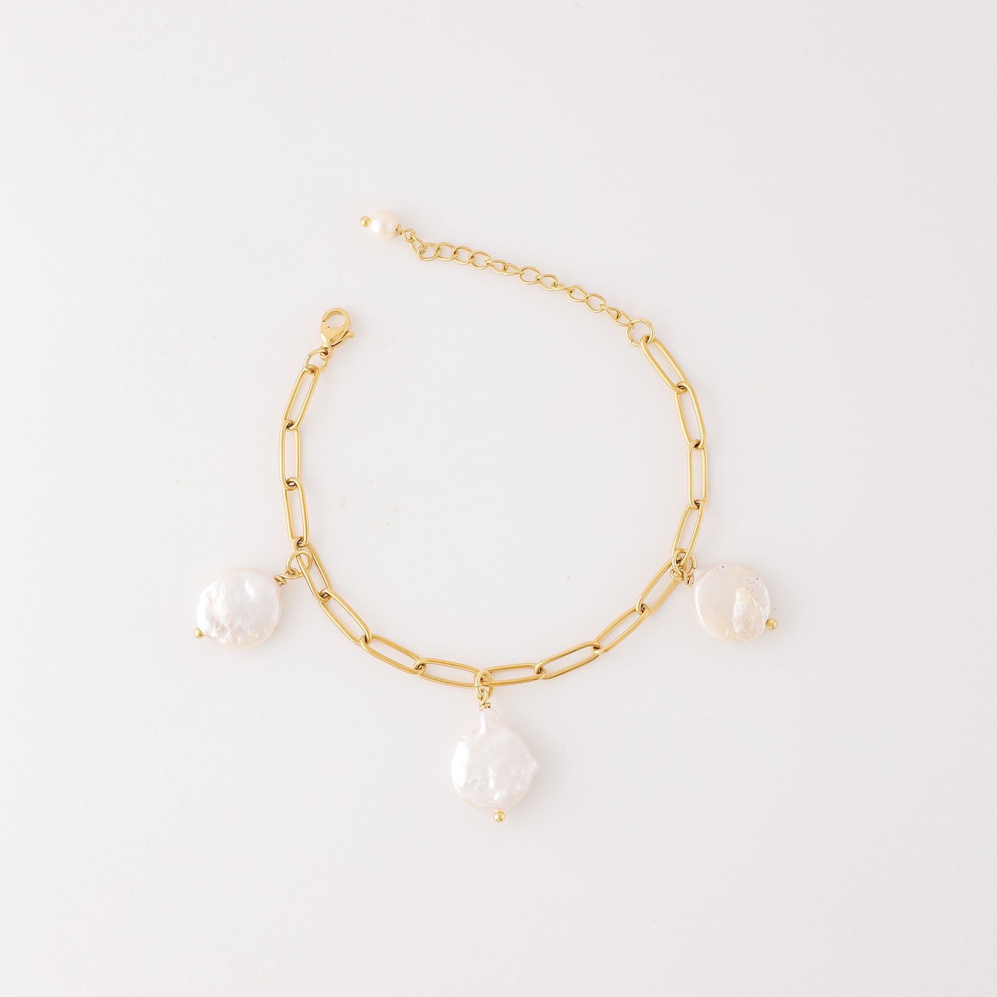 Baroque Pearl Charm Bracelet: Stainless Steel Station Bracelet