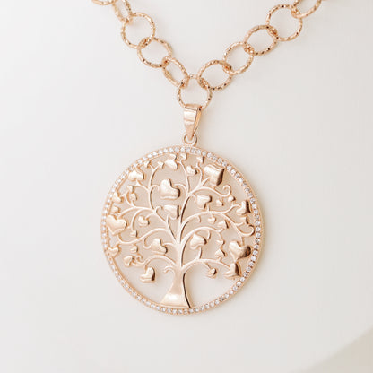 Indulge in luxury with our Tree of Life with Hearts Necklace. Crafted in rose gold, this delicate pendant features a dazzling pave tree of life design, symbolizing family and love. Perfect for Mother's Day, this necklace is a heartfelt gift that will be cherished for years to come.