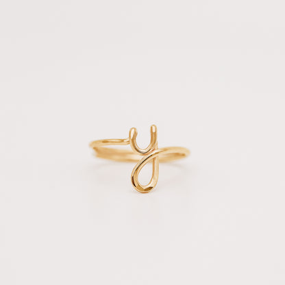 Dainty handmade gold wire ring featuring a lowercase cursive letter Y.