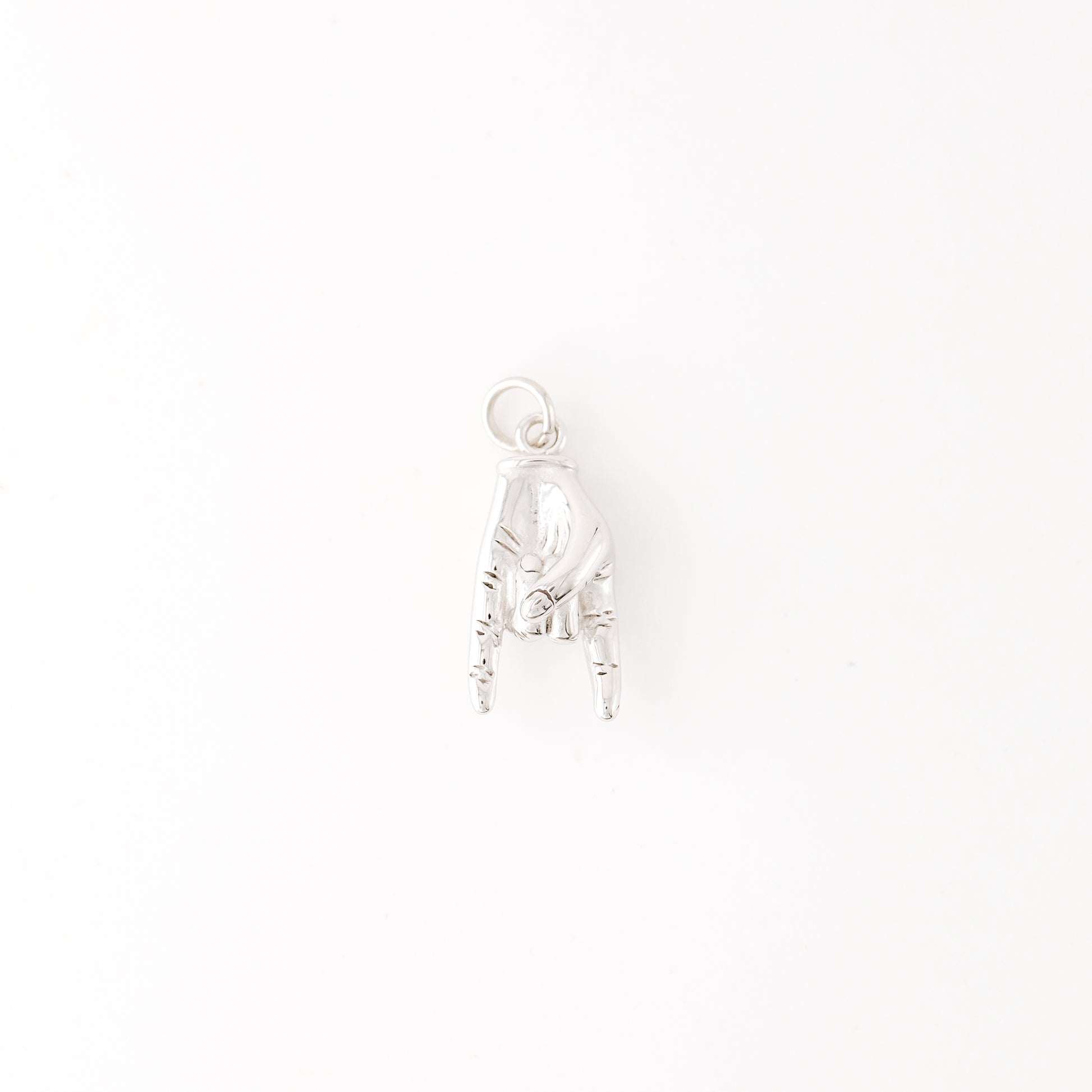 Silver Hand Gesture Charm in Stainless Steel • BYSDMJEWELS