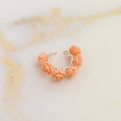 Peach coral resin rose conch ear cuff with dainty floral design and no piercing required