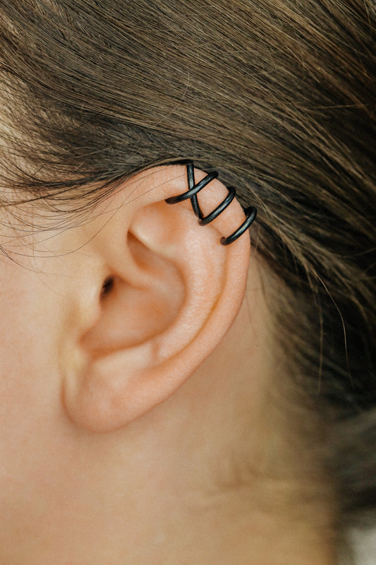 Handmade set of gold criss cross and double line helix ear cuffs for non-pierced ears, adjustable minimalist jewelry available in 12k gold filled, sterling silver, and 16 gauge black aluminum.