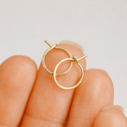 Detailed view of a handmade 12k gold filled hoop earring featuring a secure loop-and-hook closure, minimalist design for lobe and cartilage piercings.