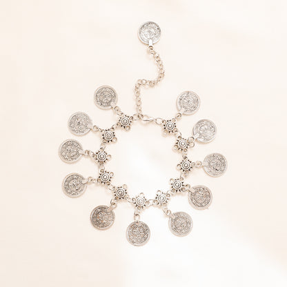 Adjustable silver coin charm anklet with dangling 17 mm coin-style charms and extender chain