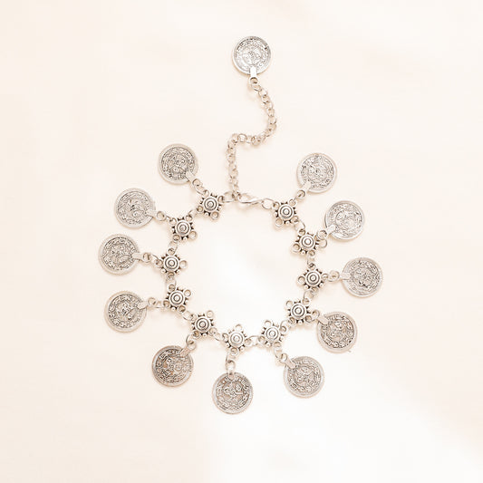 Adjustable silver coin charm anklet with dangling 17 mm coin-style charms and extender chain