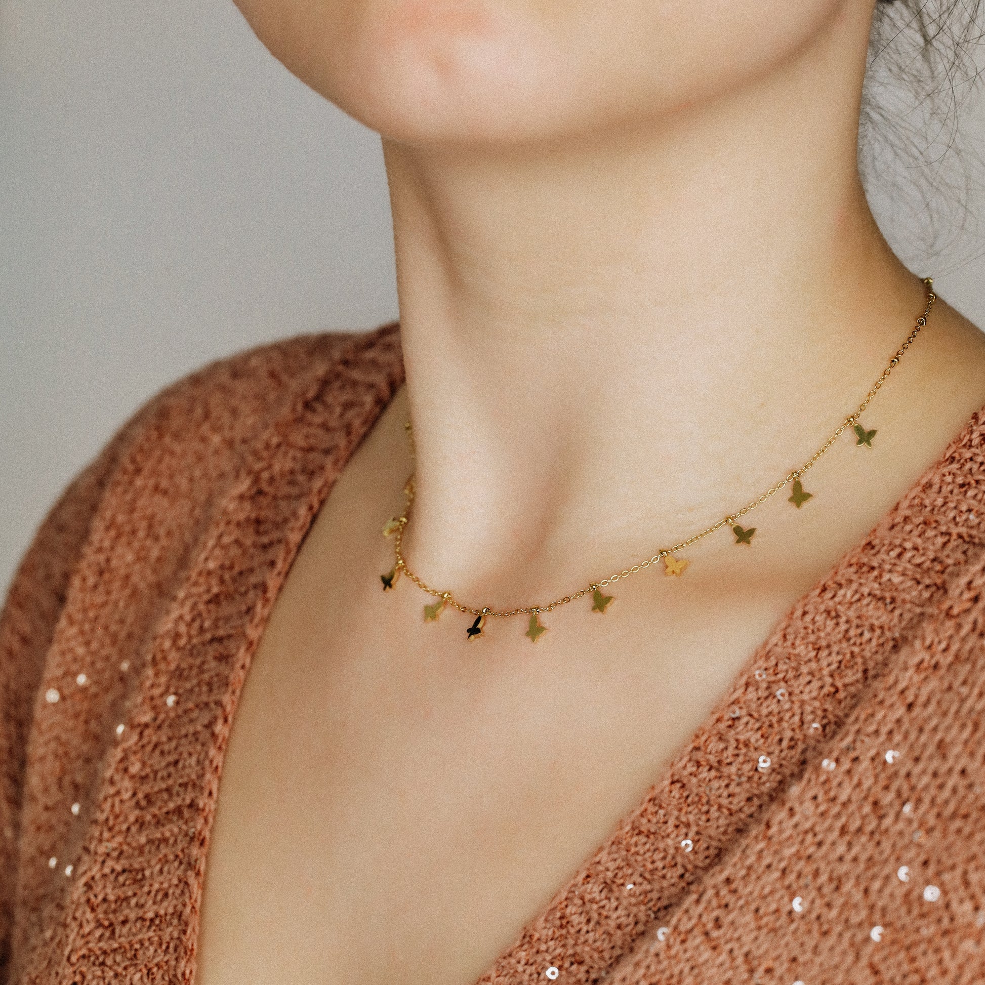 Indulge in the ethereal charm of our Butterflies Necklace! This dainty and minimal boho beaded necklace features delicate gold butterflies, creating a layered and feminine look. Perfect for adding a touch of bohemian flair to any outfit. Elevate your style with our Butterflies Necklace!