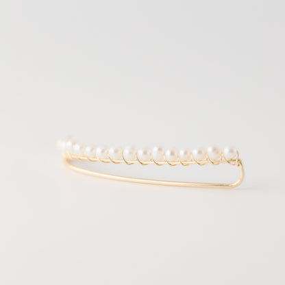 Handmade 50 mm pearl ear climber earrings worn along the natural curve of the ear, featuring tiny 2–3 mm pearls arranged in a delicate climbing design for one standard lobe piercing, available as a pair, single left ear climber or single right ear climber in solid 925 sterling silver, 14k gold filled and 14k rose gold filled, with ear climber lengths available from 10mm to 50mm.