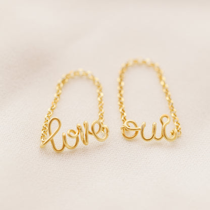 Handmade gold name ring with delicate chain detail