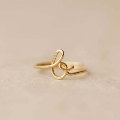 Handmade 14k gold filled wire ring shaped into the letter B.