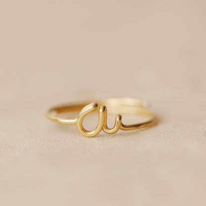 Handmade 14k gold filled wire ring shaped into the letter A.