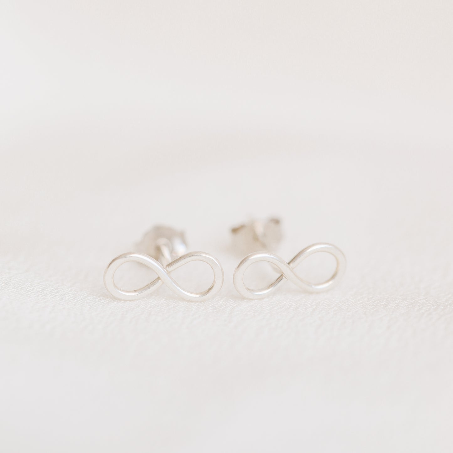 Tiny sterling silver infinity stud earrings minimalist everyday jewelry