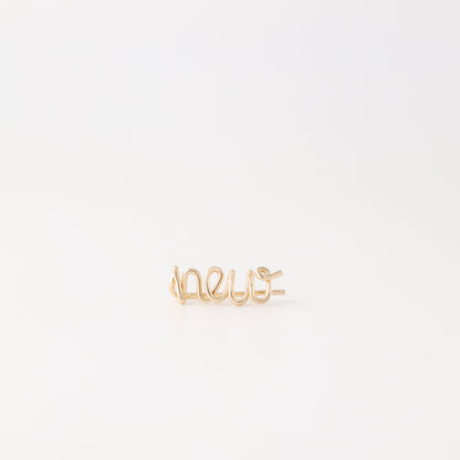 Handmade personalized name ear climber worn across the lobe through one standard piercing, featuring a custom flowing wire script design made with the chosen name or word up to 10 characters, available as a single left ear climber, single right ear climber or pair in solid 925 sterling silver, 14k gold filled and 14k rose gold filled.