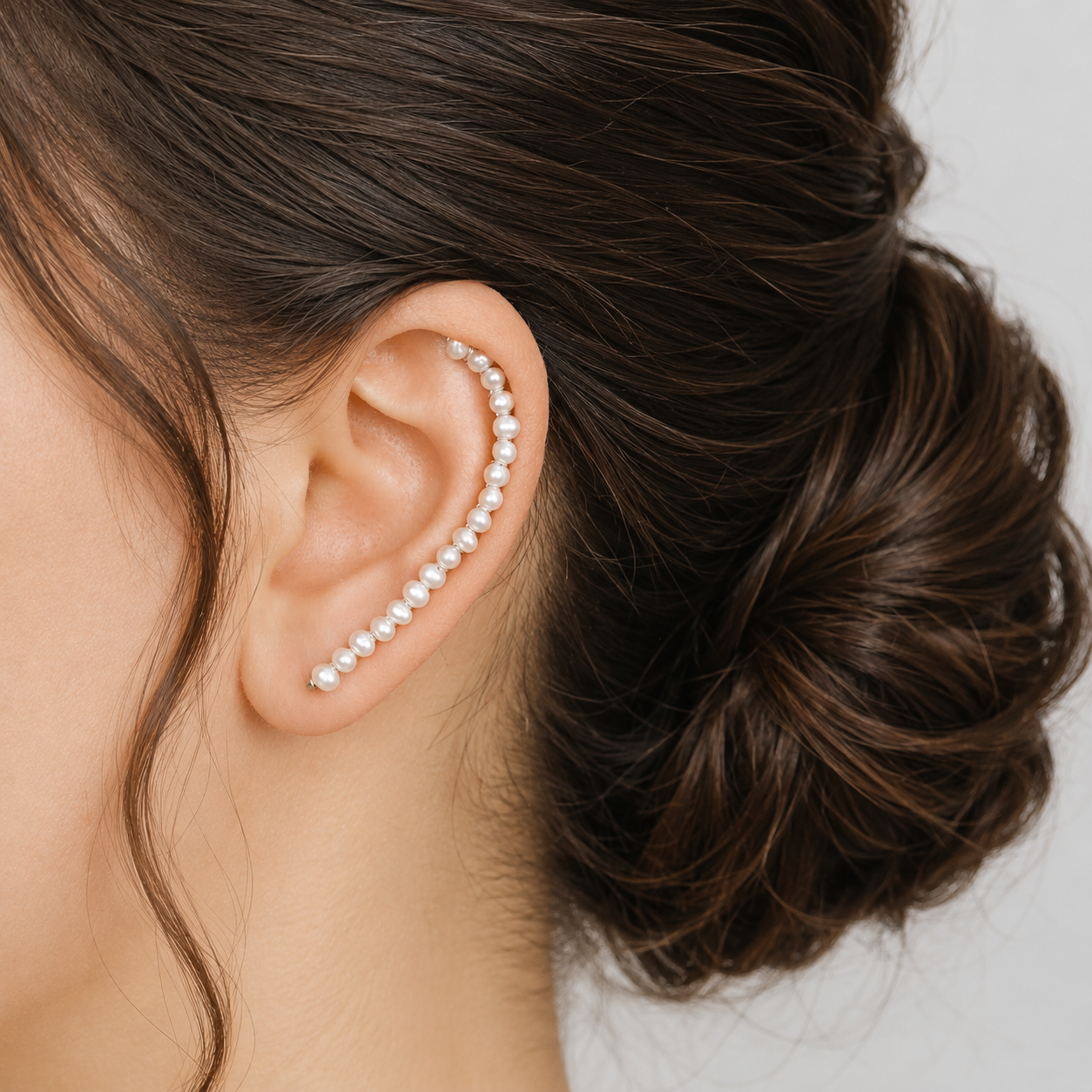 Handmade 50 mm pearl ear climber earrings worn along the natural curve of the ear, featuring tiny 2–3 mm pearls arranged in a delicate climbing design for one standard lobe piercing, available as a pair, single left ear climber or single right ear climber in solid 925 sterling silver, 14k gold filled and 14k rose gold filled, with ear climber lengths available from 10mm to 50mm.