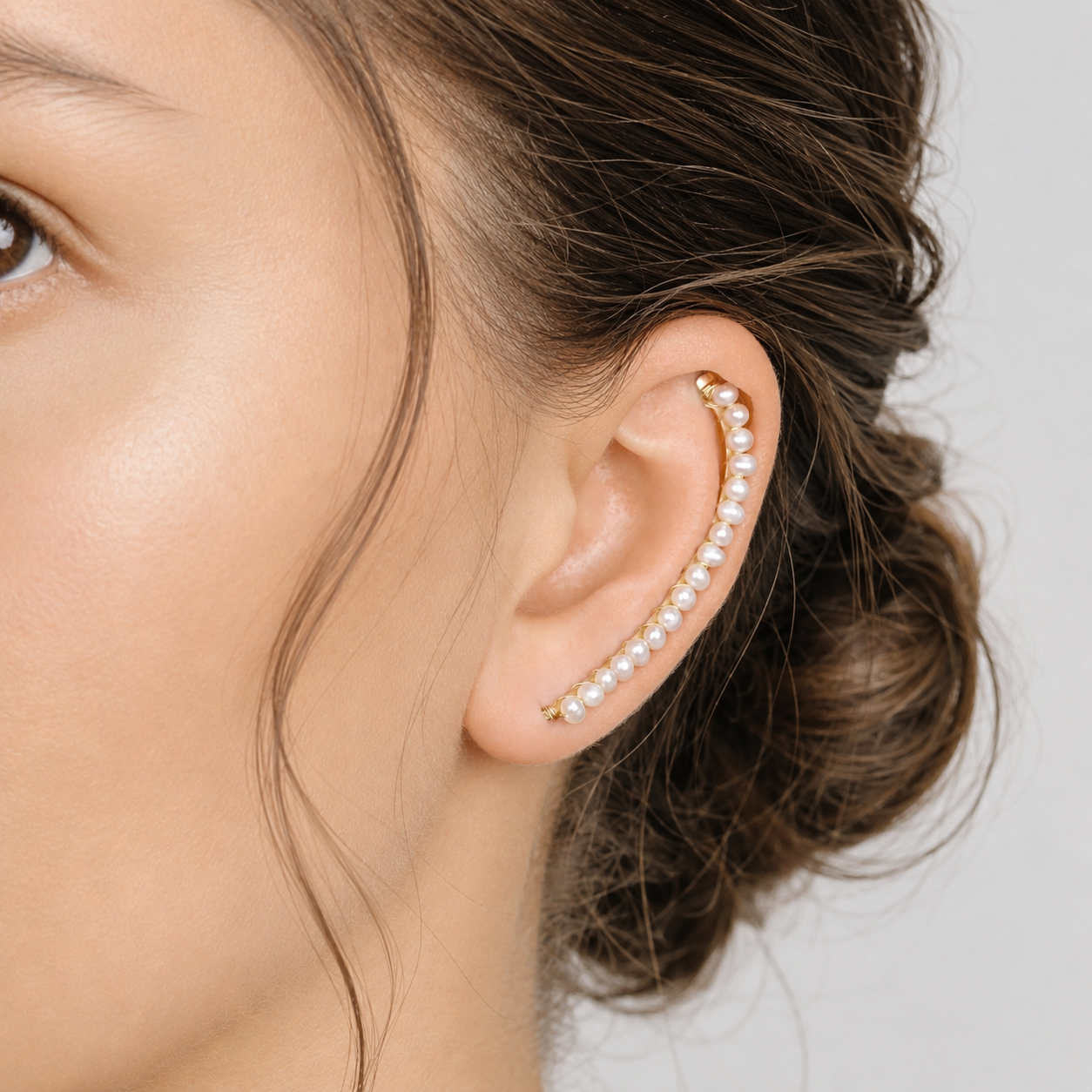 Handmade 50 mm pearl ear climber earrings worn along the natural curve of the ear, featuring tiny 2–3 mm pearls arranged in a delicate climbing design for one standard lobe piercing, available as a pair, single left ear climber or single right ear climber in solid 925 sterling silver, 14k gold filled and 14k rose gold filled, with ear climber lengths available from 10mm to 50mm.