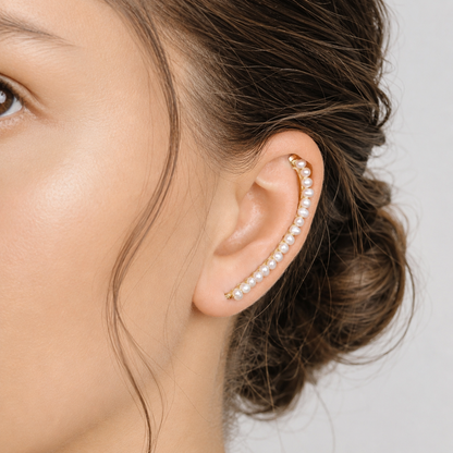Handmade 50 mm pearl ear climber earrings worn along the natural curve of the ear, featuring tiny 2–3 mm pearls arranged in a delicate climbing design for one standard lobe piercing, available as a pair, single left ear climber or single right ear climber in solid 925 sterling silver, 14k gold filled and 14k rose gold filled, with ear climber lengths available from 10mm to 50mm.