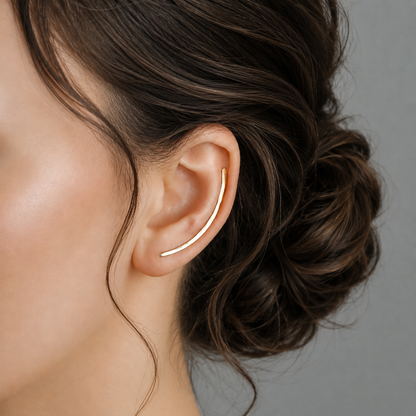 Handmade 40 mm minimalist ear climber earrings worn through one standard lobe piercing and rotated upward along the natural curve of the ear, featuring a slim hand hammered wire design with a clean long ear sweep shape, available as a single left ear climber, single right ear climber or pair in solid 925 sterling silver, 14k gold filled and 14k rose gold filled, with length options from 10mm to 50mm.