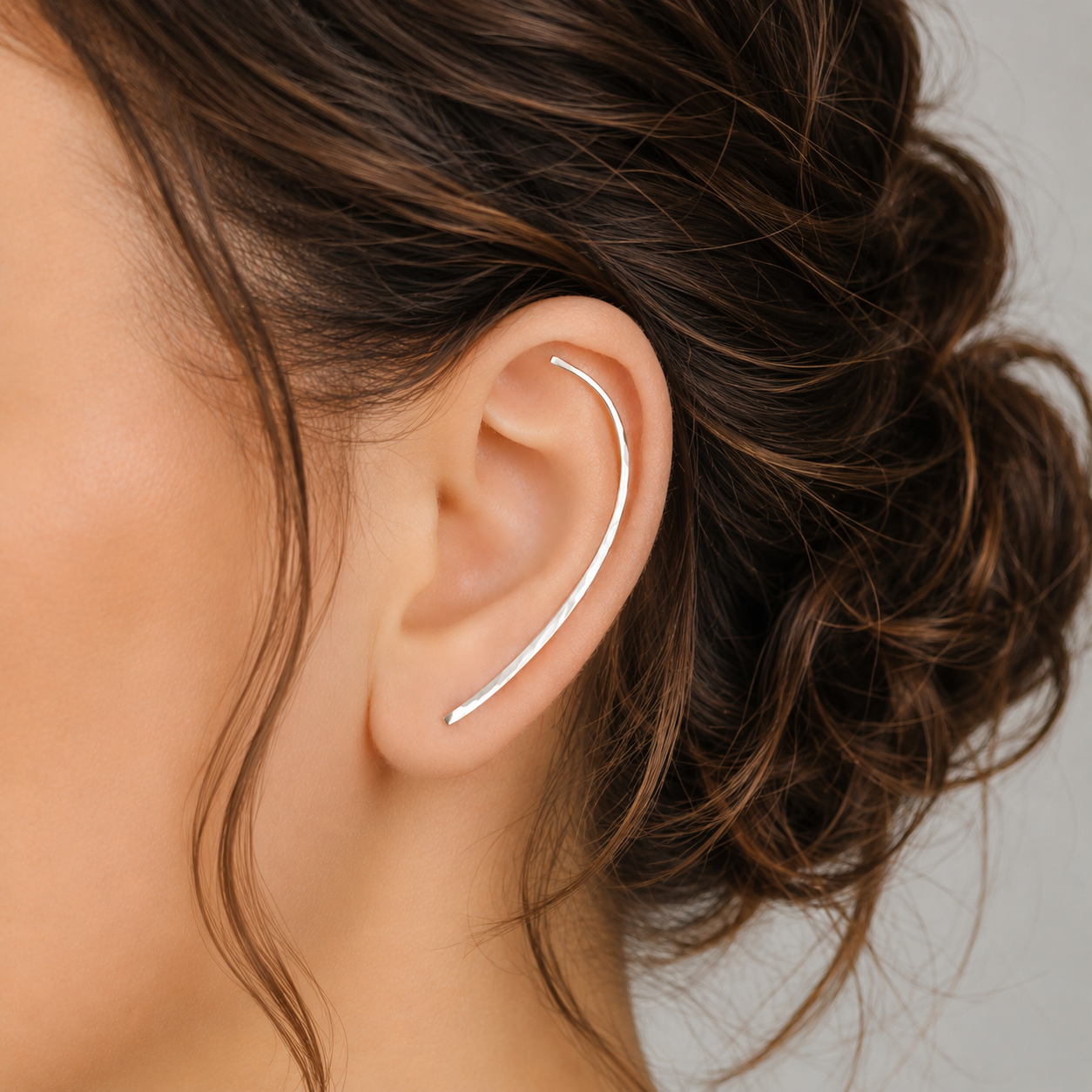 Handmade 50 mm minimalist ear climber earrings worn through one standard lobe piercing and rotated upward to follow the natural curve of the ear, featuring a long clean hand hammered wire design with an elegant ear sweep shape, available as a single left ear climber, single right ear climber or pair in solid 925 sterling silver, 14k gold filled and 14k rose gold filled, with length options from 10mm to 50mm.