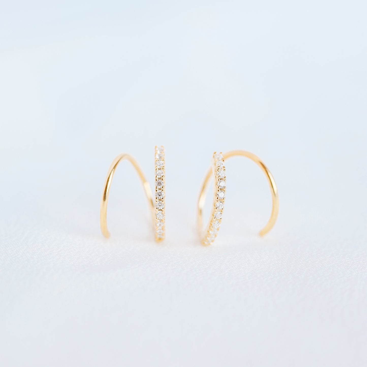 Minimalist twist huggie earring for single lobe piercing