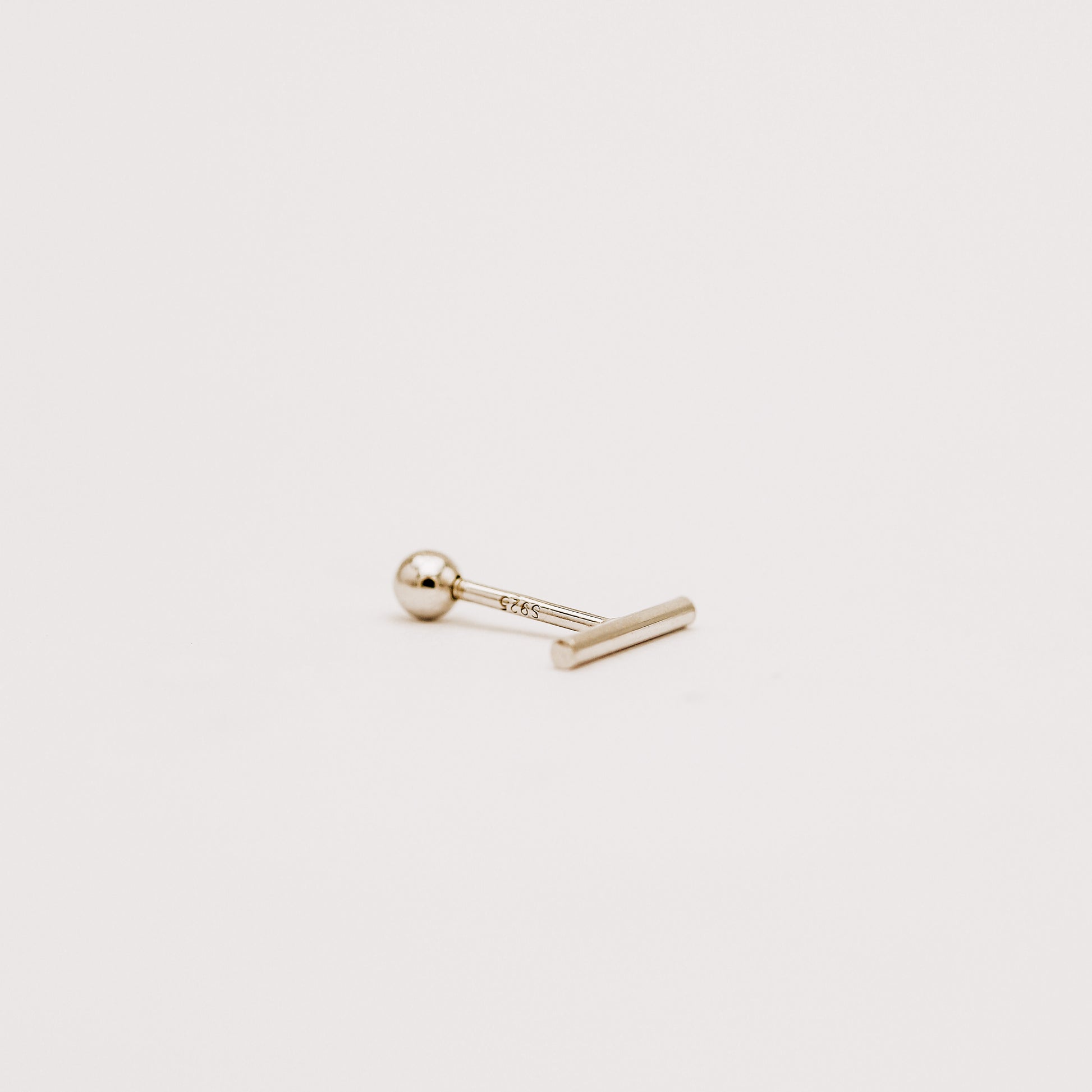 Gold plated bar earring with smooth polished finish