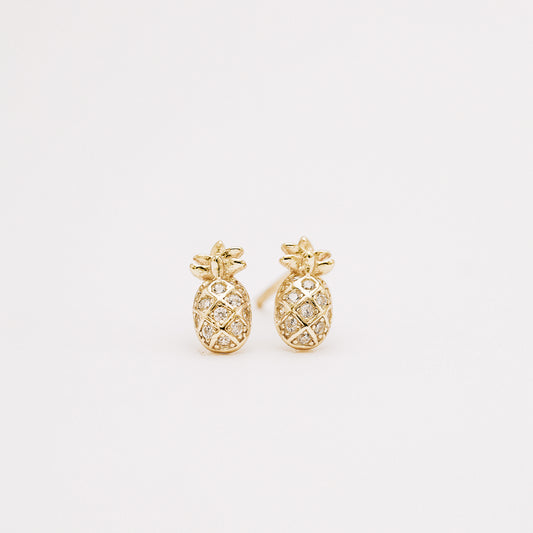 Small pineapple stud earrings with cubic zirconia on white background