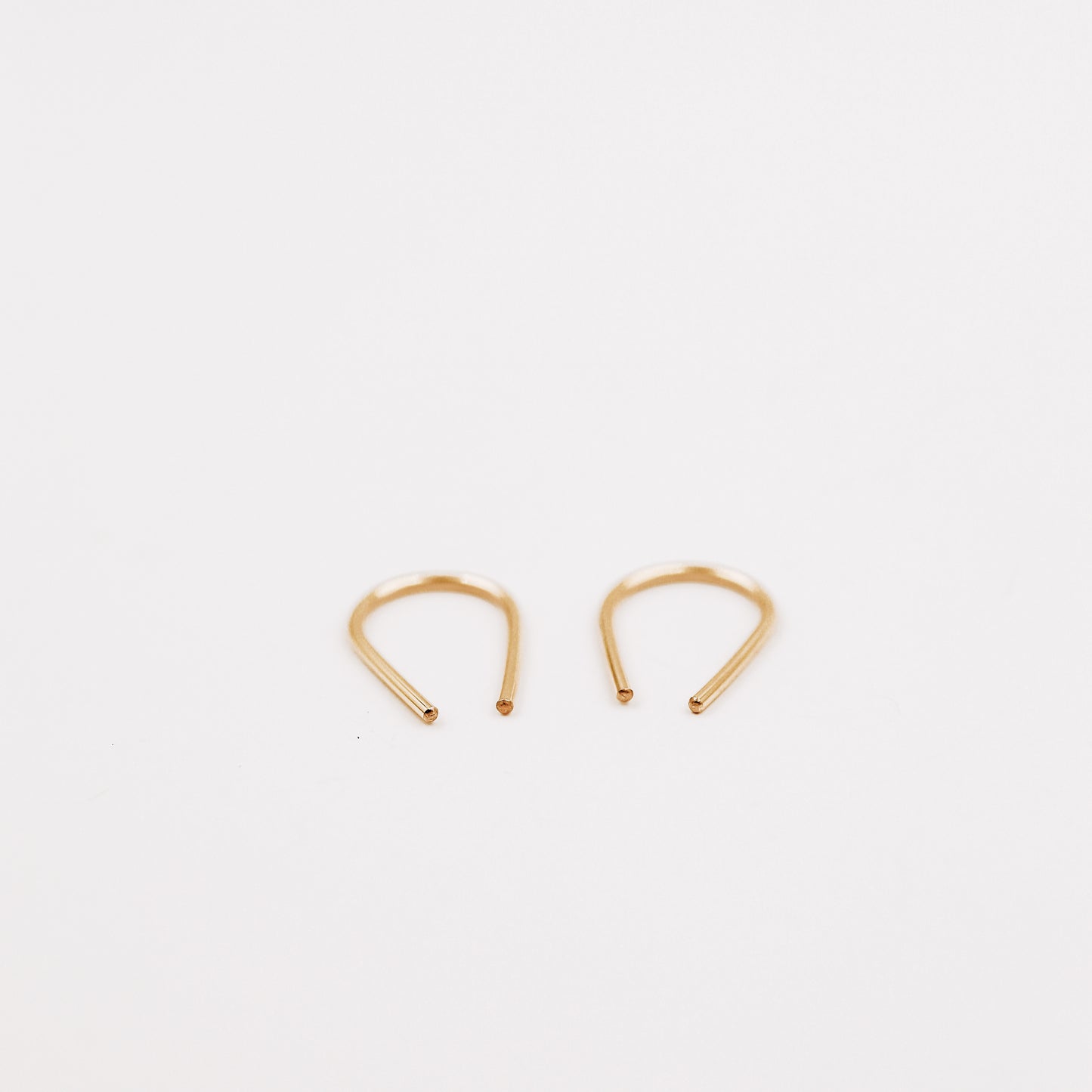 Minimal geometric hoop earrings with clean contemporary lines