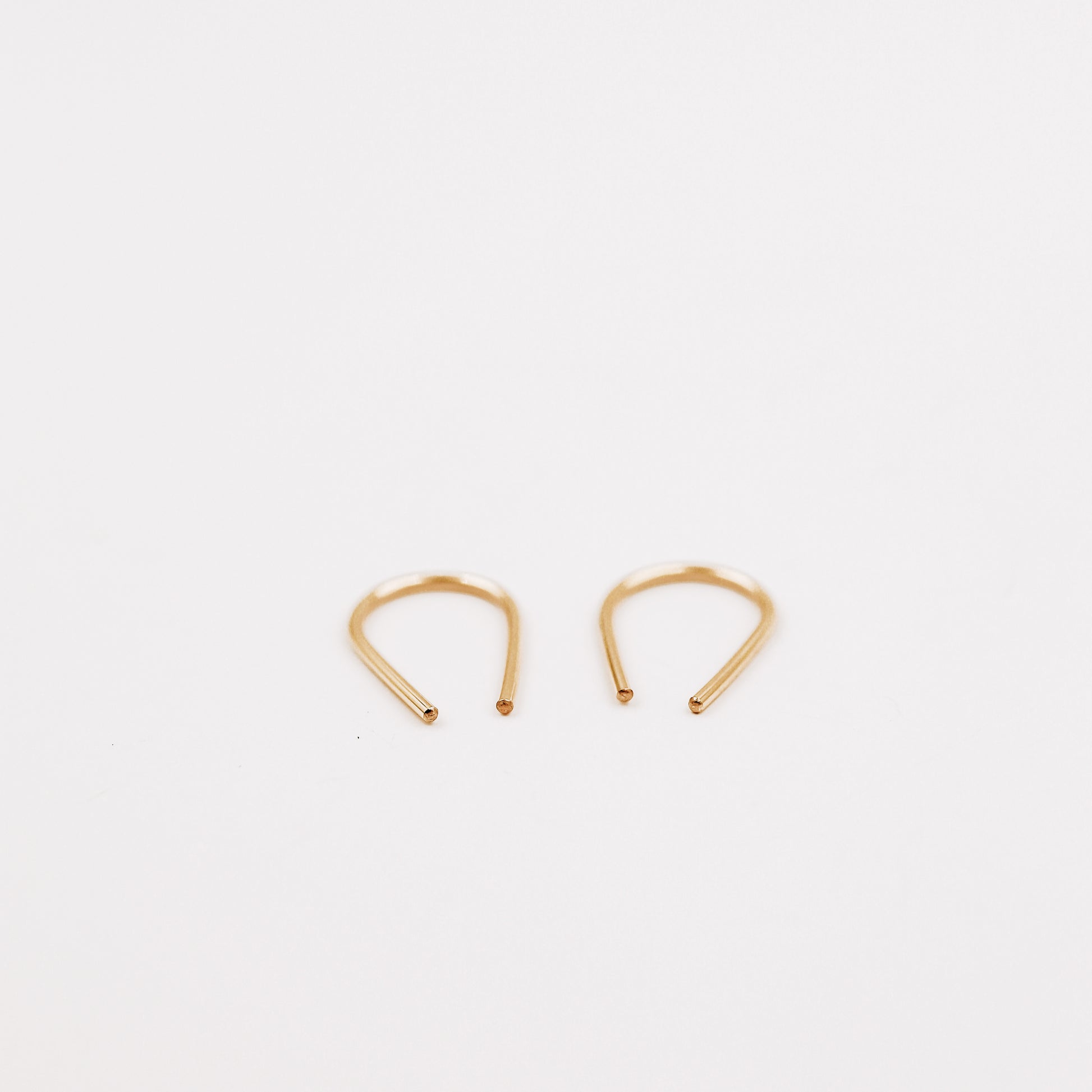 Minimal geometric hoop earrings with clean contemporary lines
