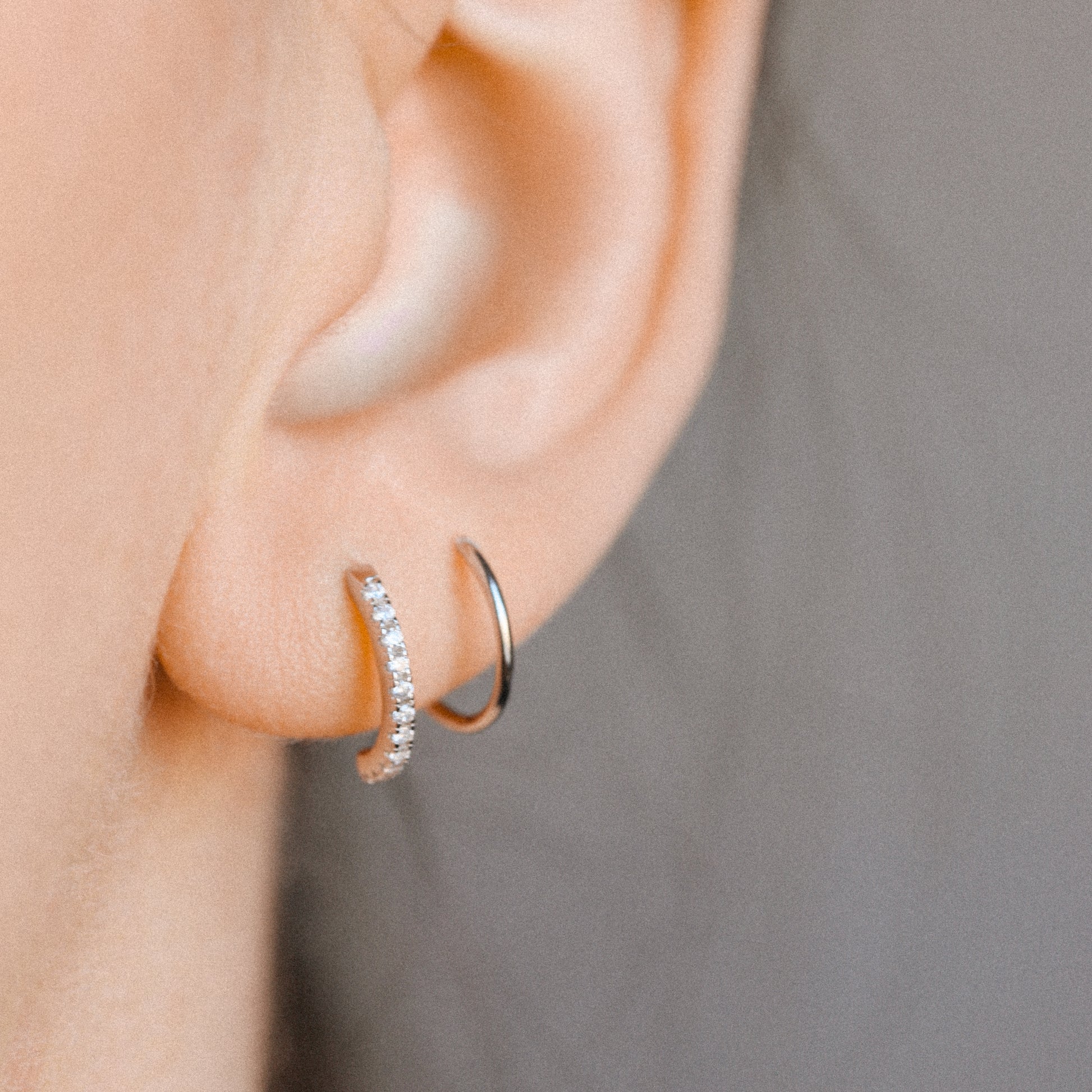 Layered ear illusion earring with sparkling cubic zirconia