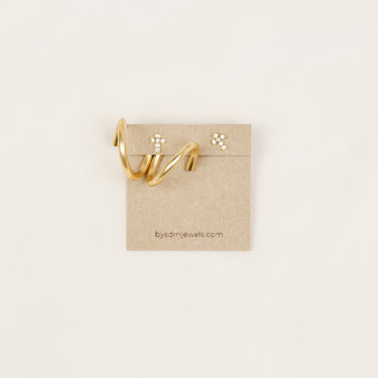 One gold wavy double loop Ear Jacket displayed with decorative cross-shaped stud earrings, illustrating the One Ear Jacket option.