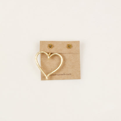 One gold Large Heart Ear Jacket displayed with small rose-shaped stud earrings, illustrating the One Ear Jacket option and asymmetric styling possibility.