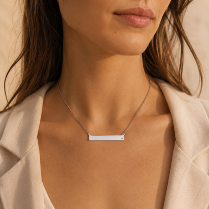 Sterling silver rectangular bar necklace worn front view with delicate chain