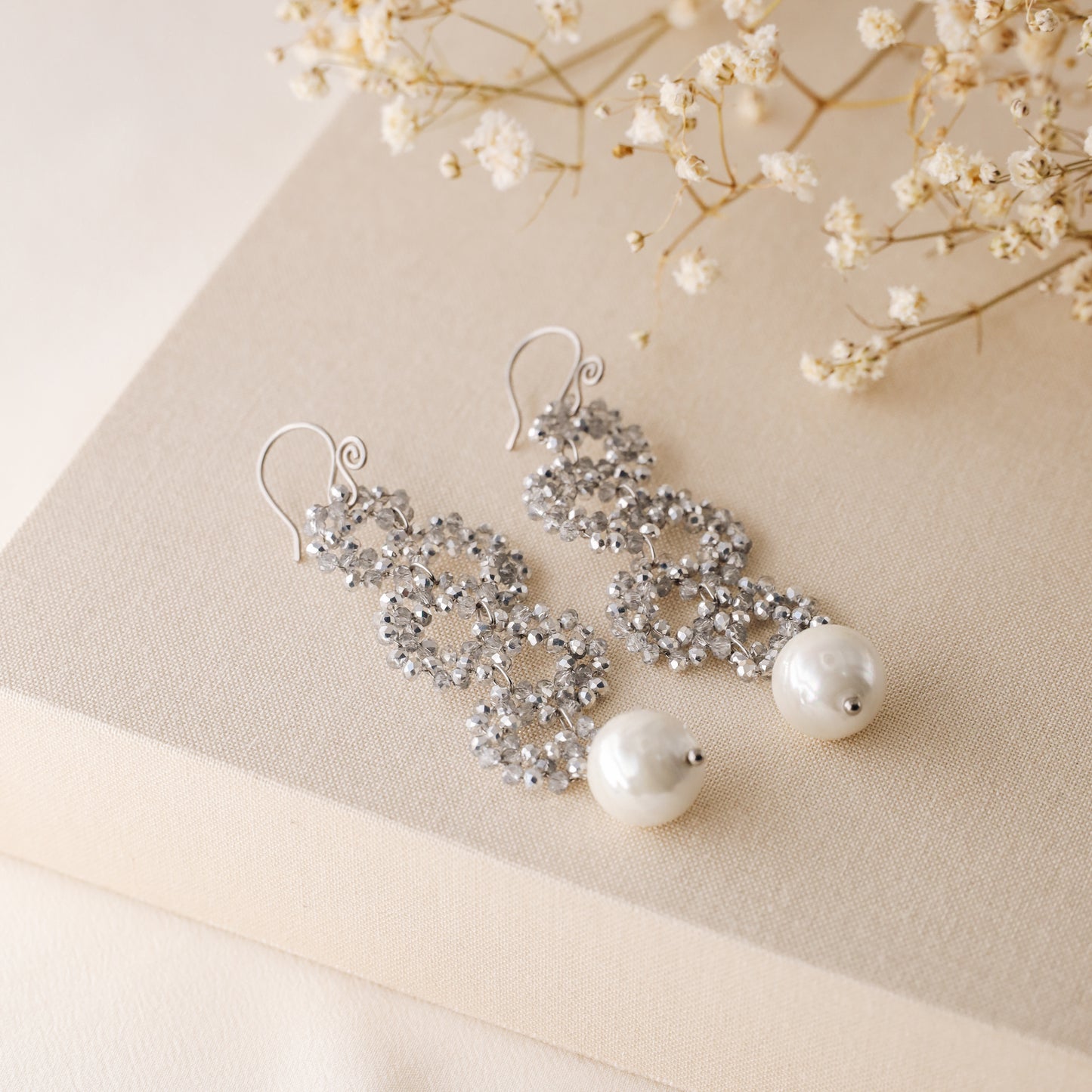 Silver iridescent crystal bead statement earrings with pearl drop and French hook closure