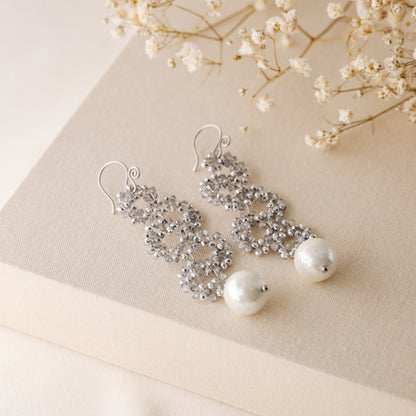 Silver iridescent crystal bead statement earrings with pearl drop and French hook closure