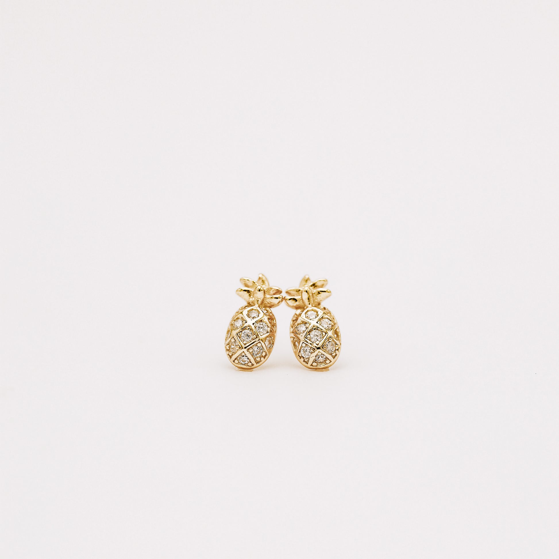 Minimal pineapple earrings inspired by tropical summer style