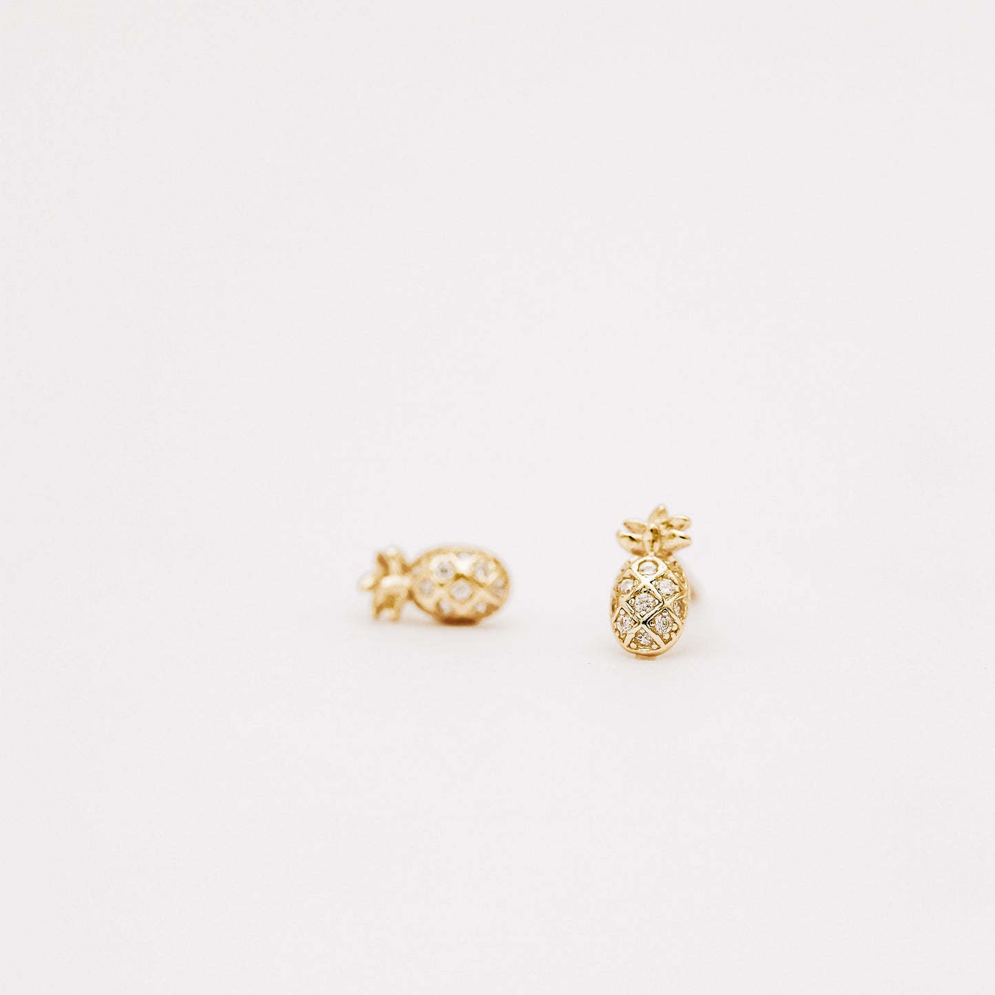 Dainty gold pineapple earrings for everyday wear